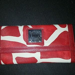 OMG giraffe print handbag